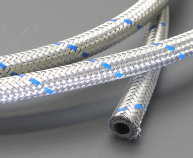 Click to enlarge - Synthetic rubber tube with a single textile braid over which a steel wire braid is laid. Very flexible and used for lubrication, oil and fuel lines. This hose is often used with the TCH range of fittings.
